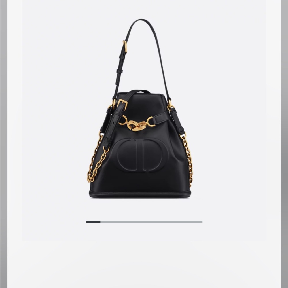 Dior Black and Gold Backpack with Structured Design